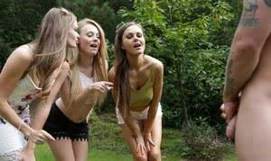 Lucky fella receives a triple blowjob in public from insatiable teenage babes