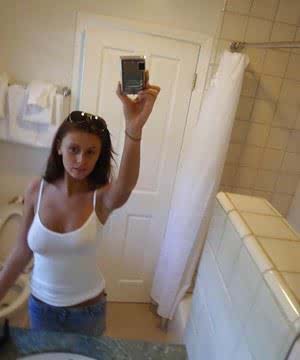 Pretty amateur Whitney likes to take selfies and show off her pussy