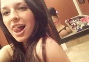 Self shot of tattooed hot teen brunette Kendra Rain posing in sexy lingerie