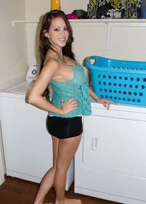 Amateur model Talia Shepard uncovers her knockers while doing laundry