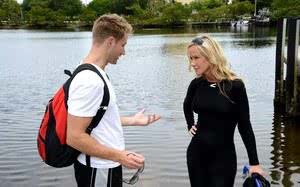 Blonde chick in wetsuit gets picked up at the lake for a quickie