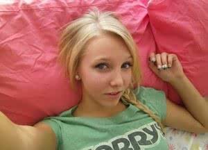 Cute blonde teen snaps self shots of her bare boobs in cutoff jean shorts