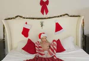 Hot blonde babe in a Christmas costume Piper Perri plays an outstanding solo