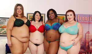 SSBBW girls in heels with huge saggy tits toying with strapon in lesbian orgy