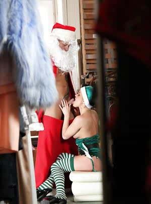 Salacious teenage girl in elf uniform gets banged by a naughty Santa