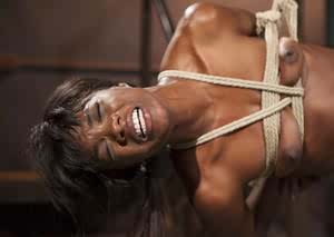 Hot black girl Ana Foxxx has her asshole brutalized while shes tied up