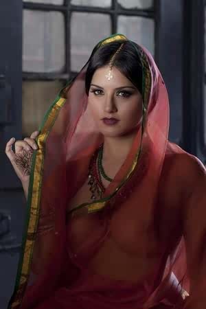 Busty solo girl Sunny Leone models solo in see thru Indian attire