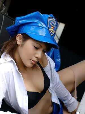 Alluring asian babe with neat ass taking off her police uniform