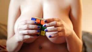 Topless babe Tessa Fowler doing nerdy and geeky things with Rubiks cube