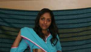 Hot Indian slut Divya removes her shirt to show her big dark nipples