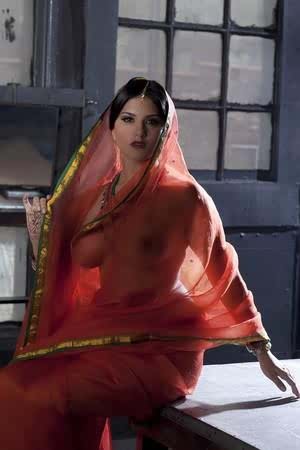 Busty solo girl Sunny Leone models solo in see thru Indian attire