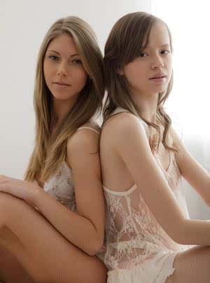 2 young girls explore lesbian sex in lingerie and white socks