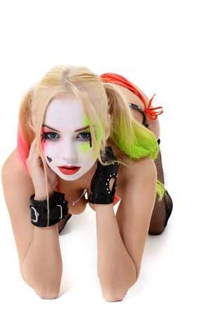 Solo girl with a painted face strips naked after putting down her baseball bat