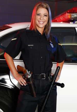 Sassy hottie in police uniform undressing and spreading her legs