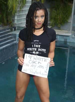 Black girl Kira Noir gives a rimjob while sucking a large white cock