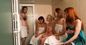 A unisex sauna is a great place for aCFNM handjob from four sexy ladies