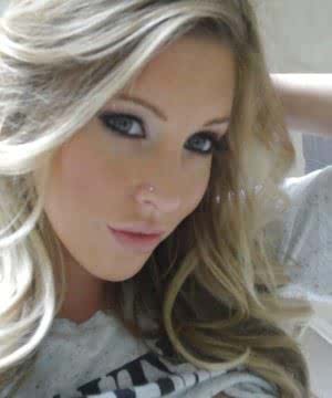 Young blonde Samantha Saint taking nude selfies in the bathroom