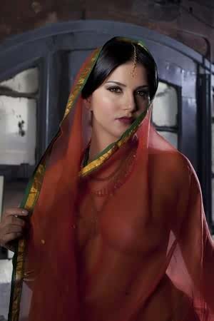 Busty solo girl Sunny Leone models solo in see thru Indian attire