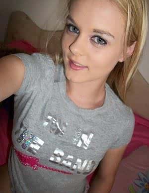 Cute blonde girl Bri Skies takes selfies while she exposes her horny body