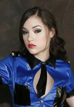 Sexy babe in police uniform Sasha Grey uncovering her tiny curves