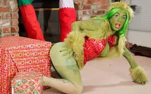 Solo model Joanna Angel showing off pussy and asshole dressed as Green Lady