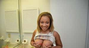 Young ebony MILF Mandy Rivers putting on makeup and flashing black tits