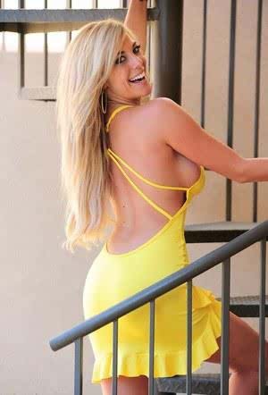 Blonde beauty Gisele bares her big knockers and firm ass in a yellow dress