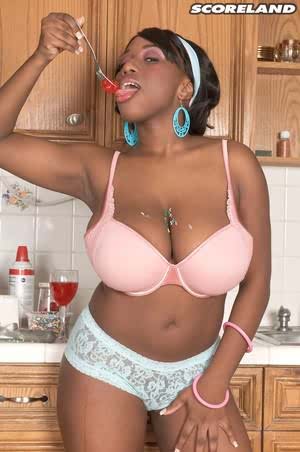 Big boobed ebony chick Janet Jade covers herself in candy sparkles