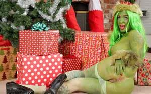 Solo model Joanna Angel showing off pussy and asshole dressed as Green Lady