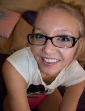 Nerdy blonde teen gets naked and rides a Sybian sex machine to an orgasm