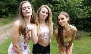 Three hotties please a horny voyeur by the side of a private lake