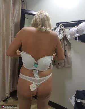 Chubby mature wife Lorna Blu changes form white to red to black sexy lingerie