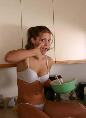 Teen amateur fixes herself breakfast in a white bra and thong combo